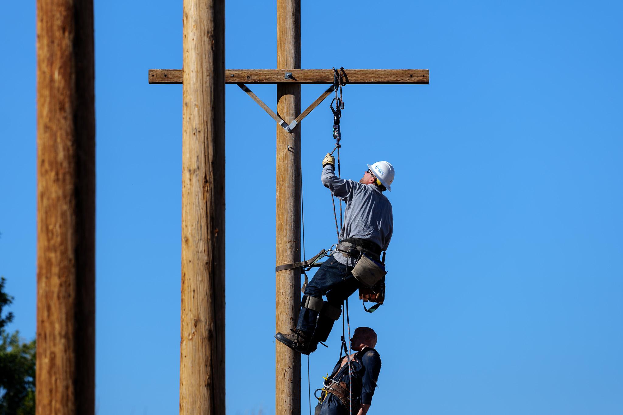 Linemen Climbing